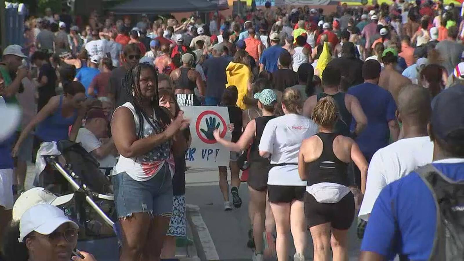 Thousands of spectators cheer on runners at 55th annual AJC Peachtree