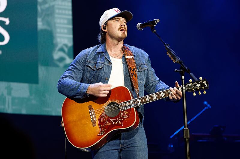 Morgan Wallen performs on stage.