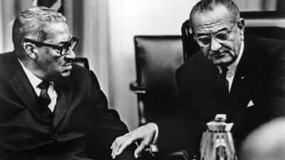 21st August 1967: Judge Thurgood Marshall (left) in discussion with statesman Lyndon Baines Johnson, 36th President of the United States of America, following Marshall's appointment as a member of the Supreme Court, the first African-American to hold such a post. (Photo by Keystone/Getty Images)